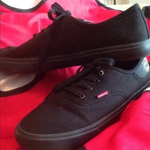 Brand new never worn black Levi shoes